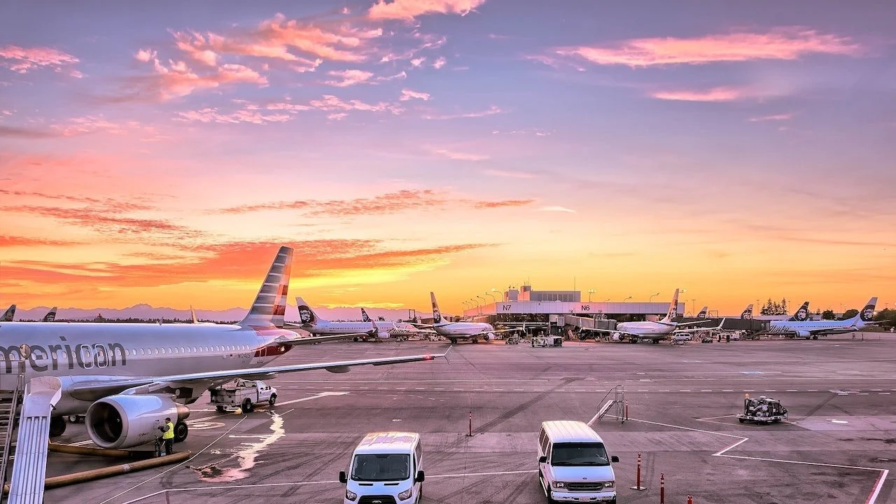 Airport with colourful sunset in background Airport with colourful sunset in background
