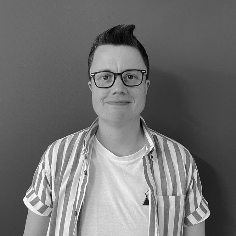 Black and white image of Em Fenton, Senior Director of Climate Diplomacy at Opportunity Green.