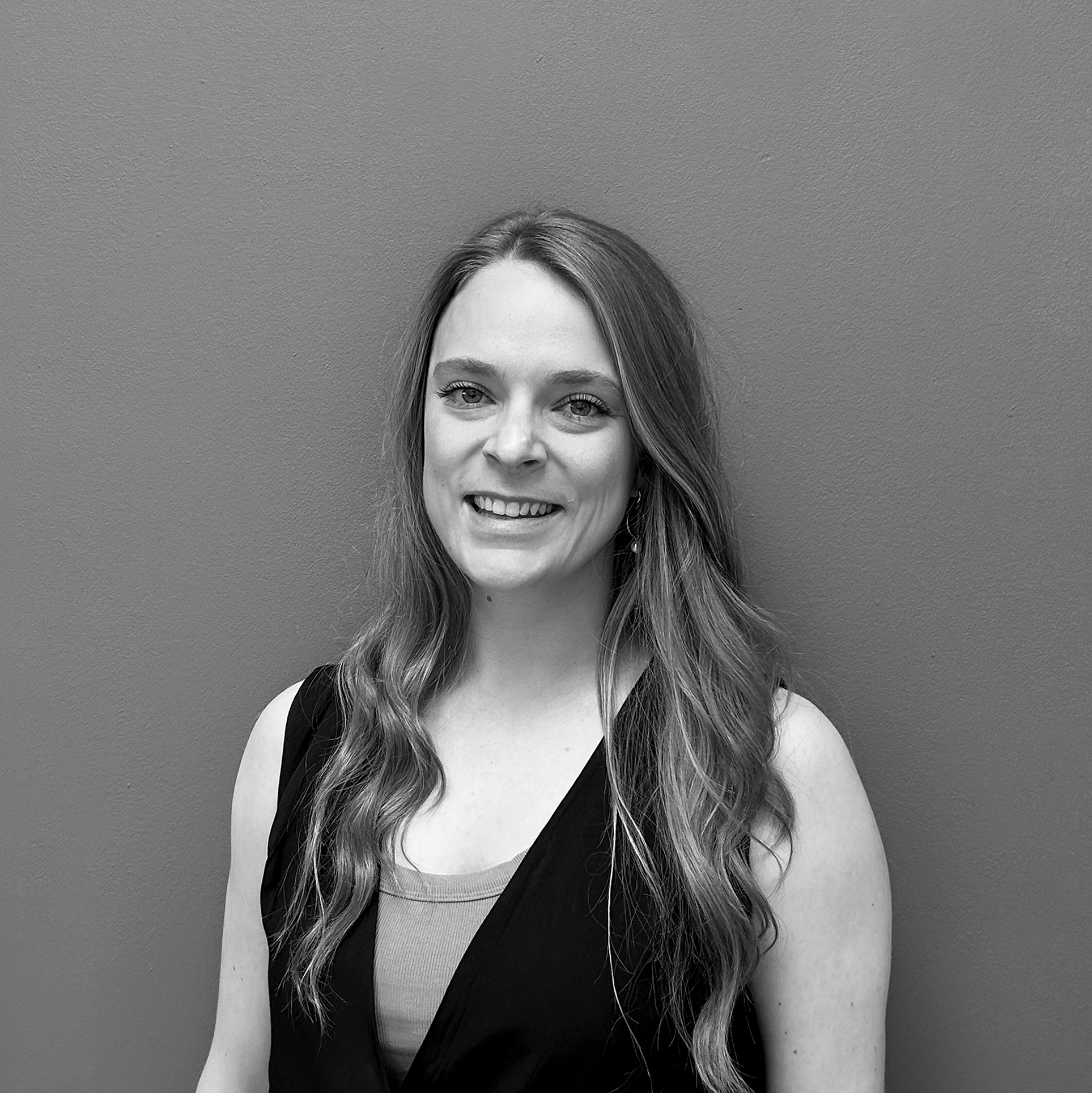 Black and white image of Kirsty Mitchell, Legal Manager at Opportunity Green.