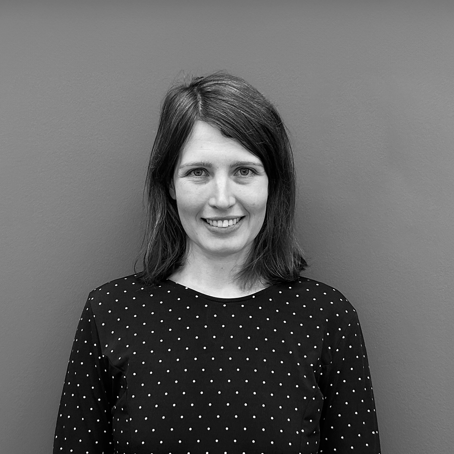 Black and white image of Zuzka Majcova, People and Culture Manager at Opportunity Green.