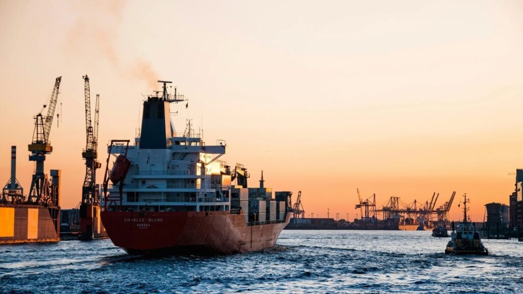Ship on the sea over sunset