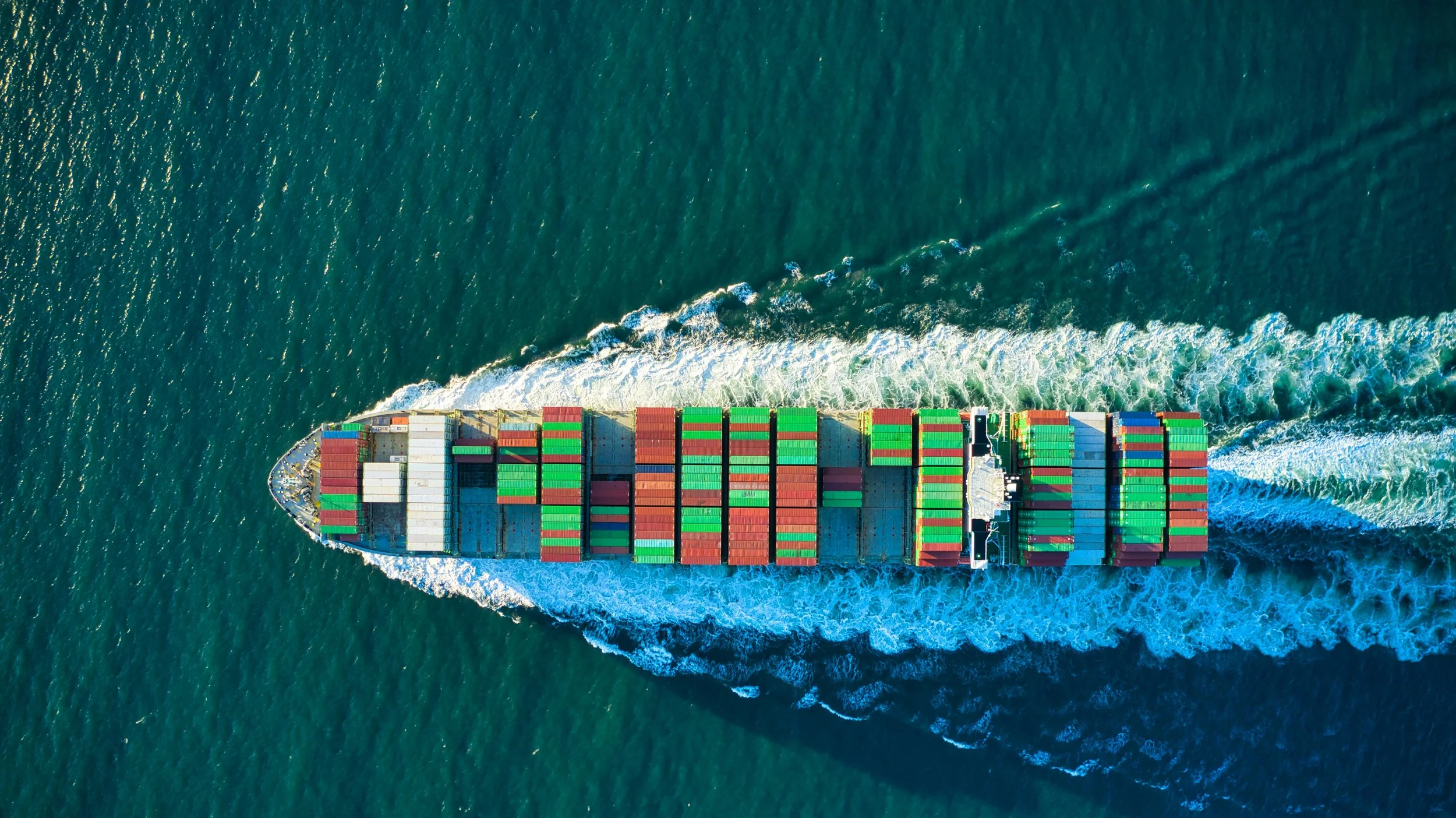 A colourful freight ship in the sea A colourful freight ship in the sea