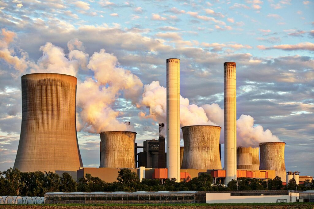 Chimneys belching thick smoke at a steel-making factory
