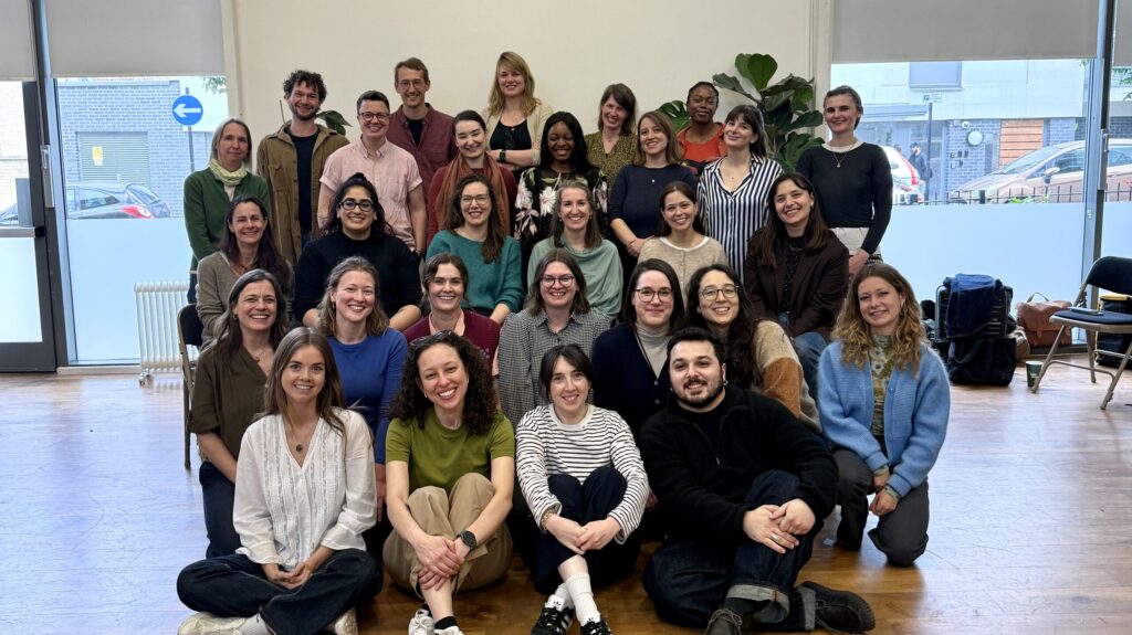 A happy group shot of the Opportunity Green team