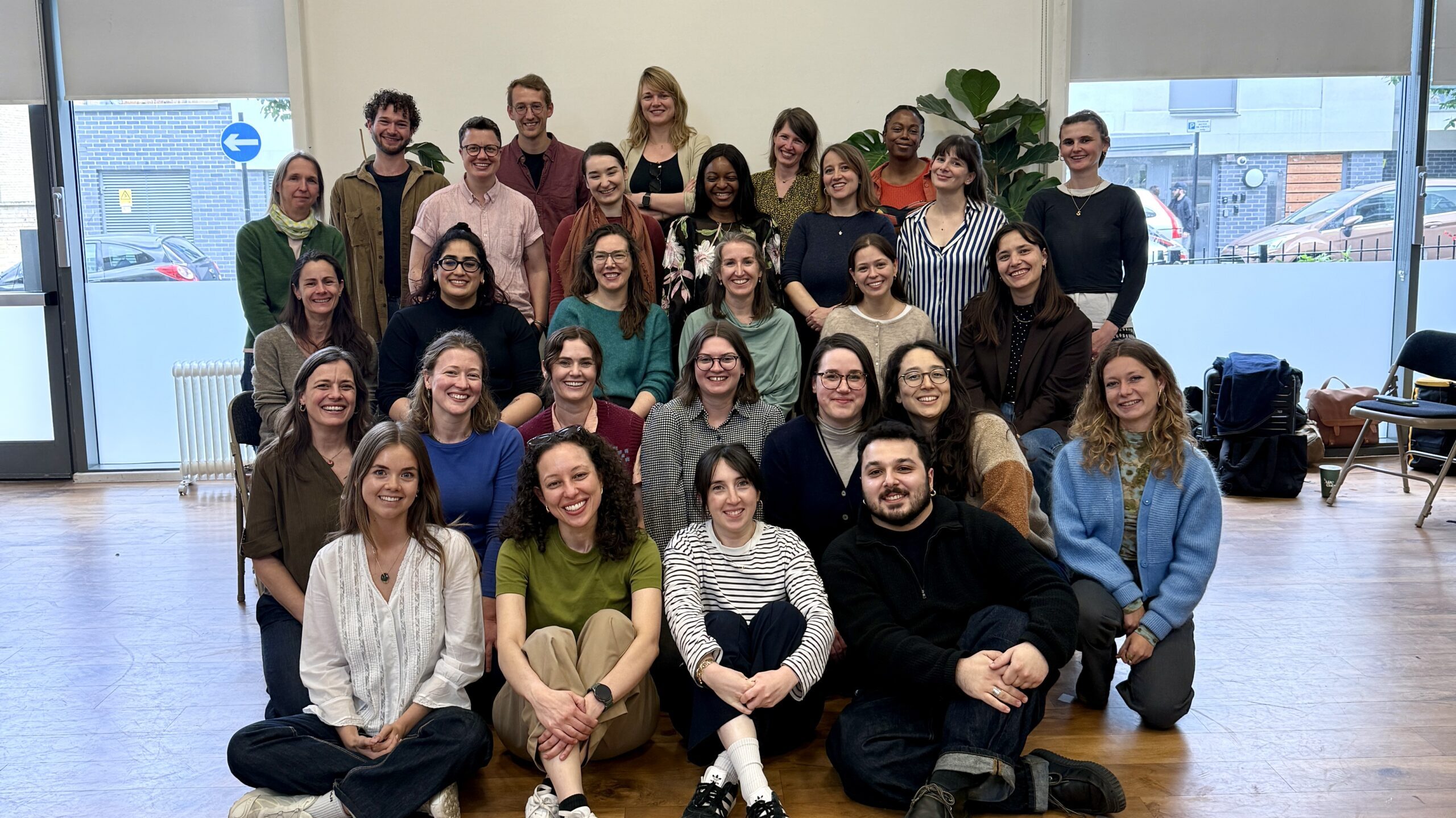A happy group shot of the Opportunity Green team